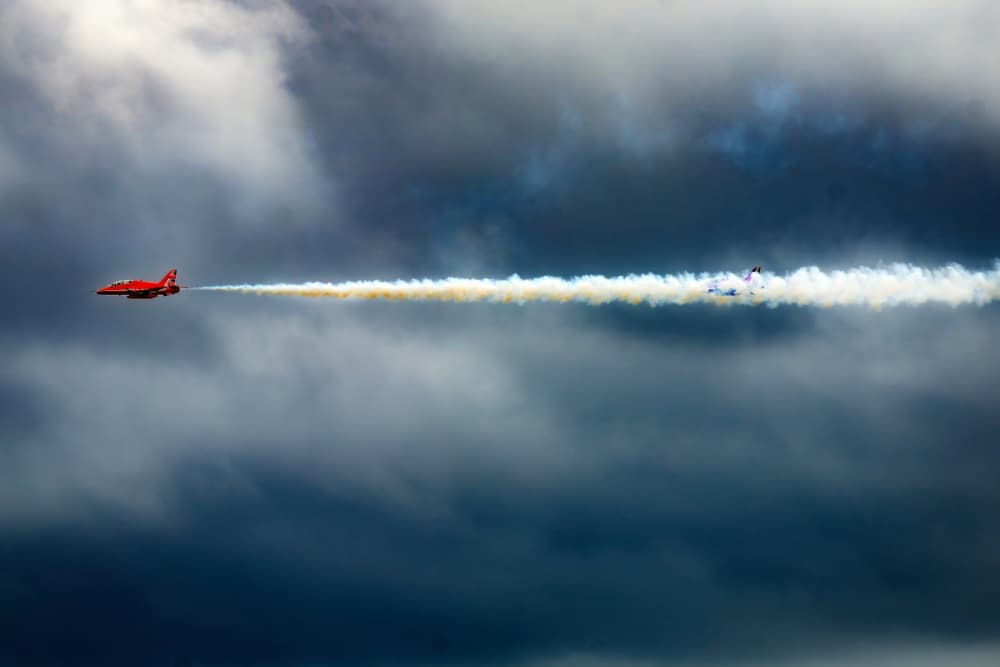 Red Jet Smoke Trail by Lee Kershaw — canvas wall art