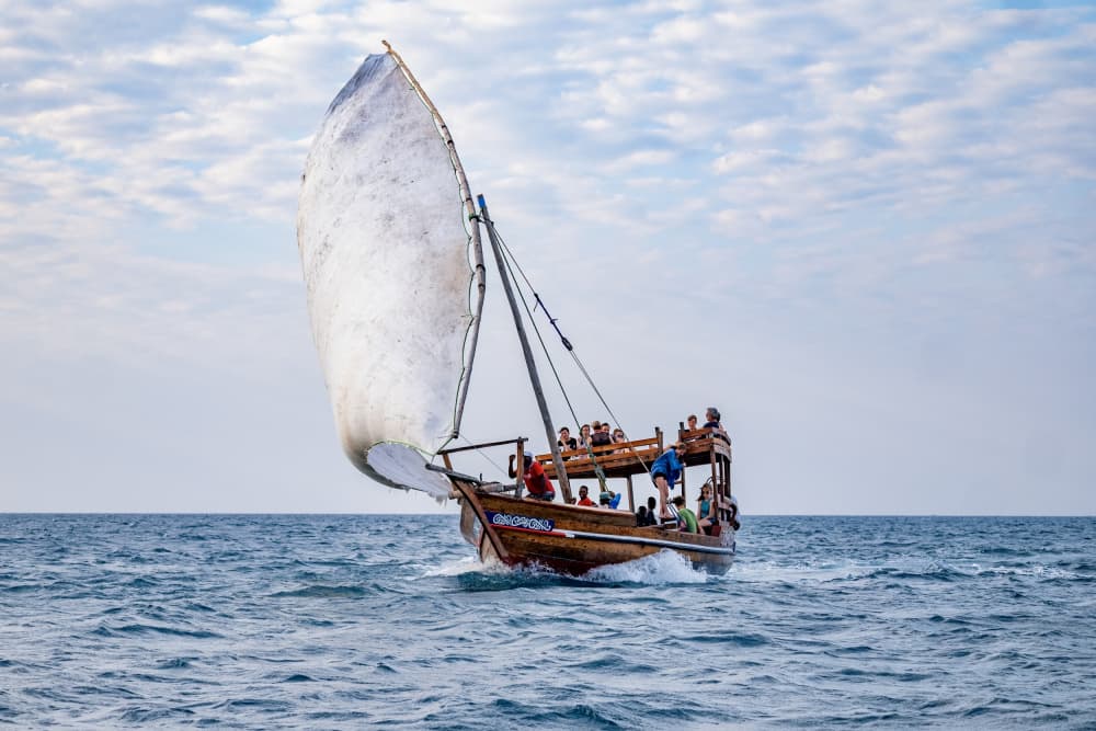 Traditional Boat Sailing by Serge Melesan — canvas wall art