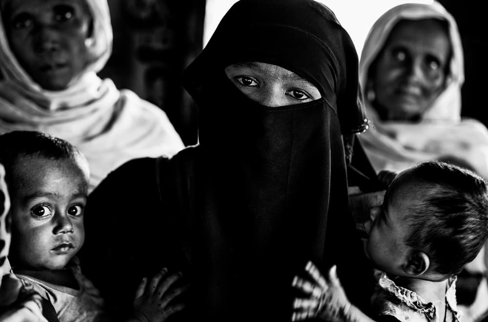 Rohingya refugee woman with her children-Bangladesh by Joxe Inazio Kuesta Garmendia — canvas wall art
