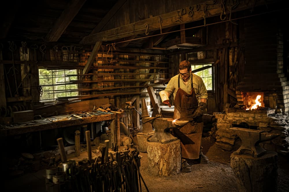 Blacksmith At The Forge by Betty Liu — canvas wall art