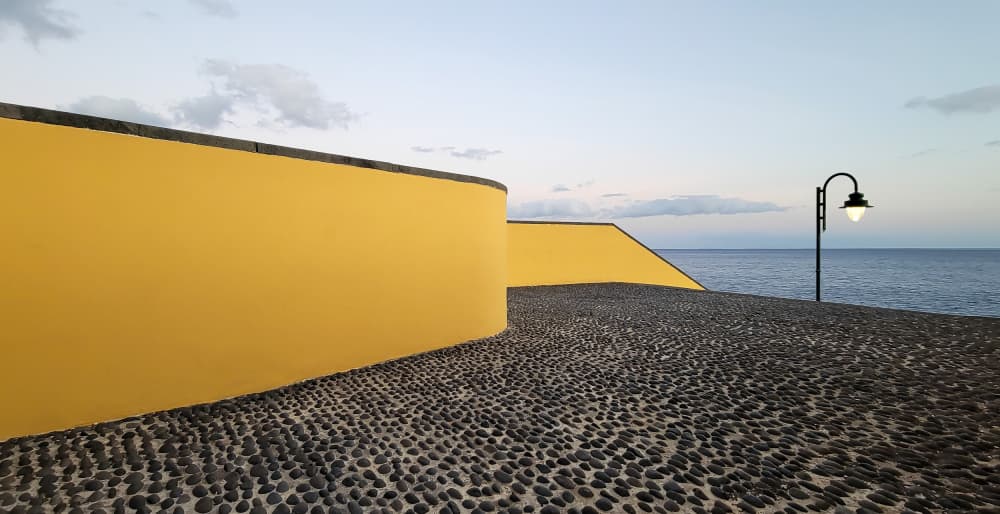 Yellow Wall By The Sea by Markus Auerbach — canvas wall art