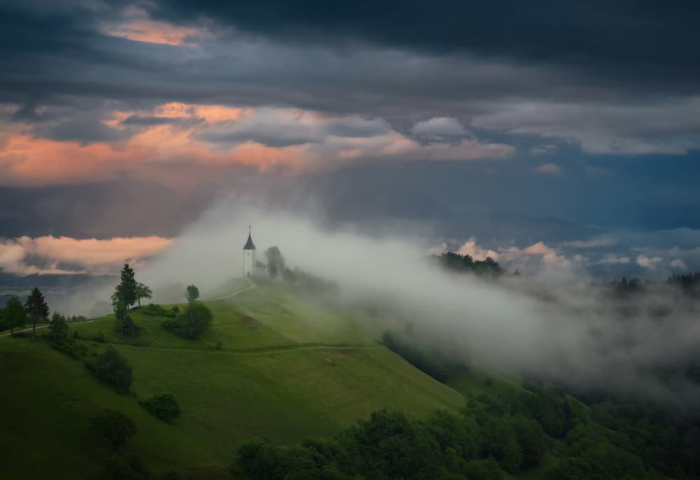 Misty Hilltop Church by Ales Komovec — canvas wall art