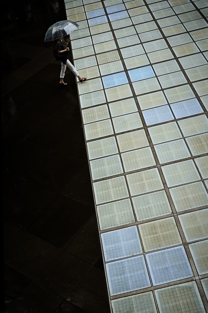 Woman With Umbrella Tiles by Reiko kiri — canvas wall art