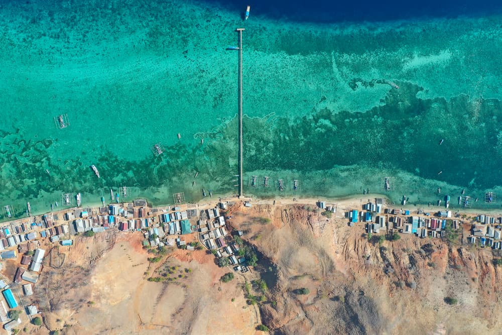 Turquoise Coastal Village by Muslianshah Masrie — canvas wall art