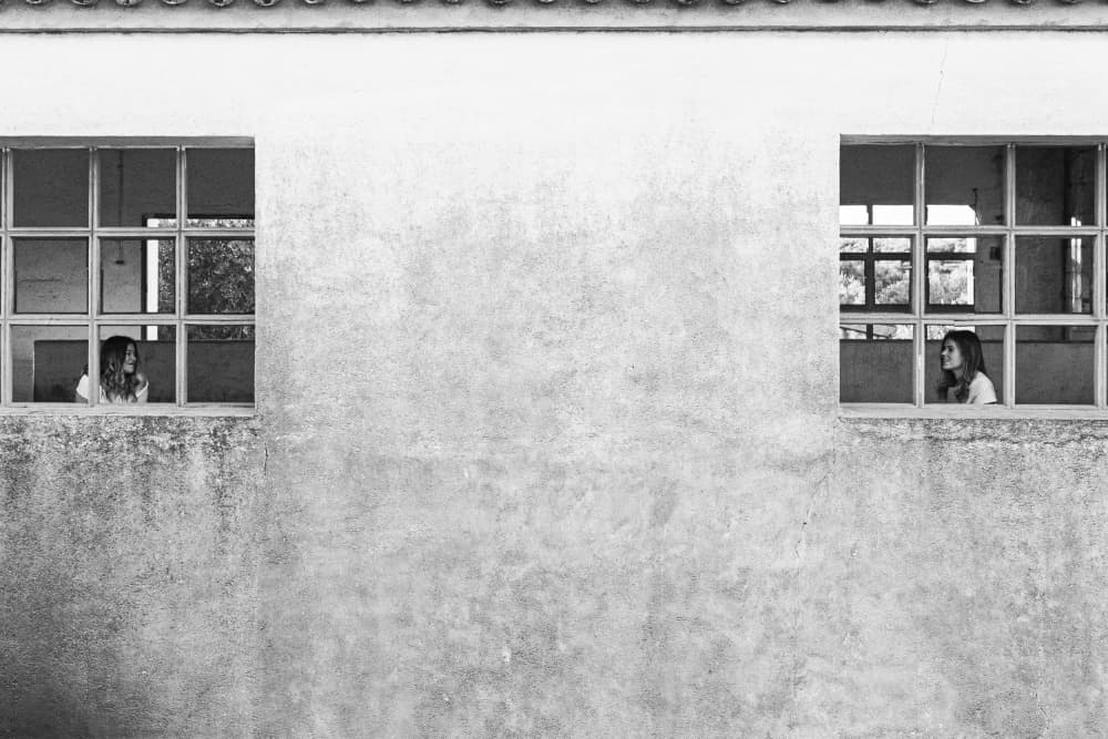 Two Girls In Windows by Juan José — canvas wall art