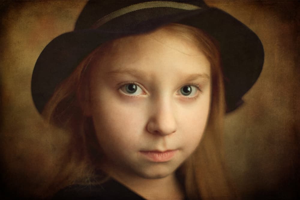 Pensive Girl in Fedora by Andriy Kovach — canvas wall art