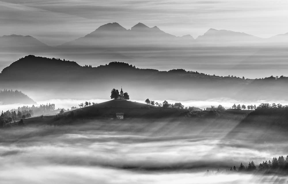 Misty Hilltop Church by Ales Krivec — canvas wall art