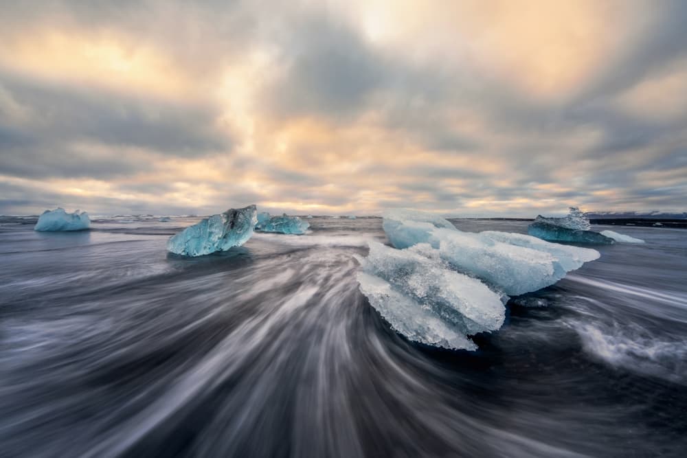Icebergs Black Sand Beach by Andrea Maestosi — canvas wall art