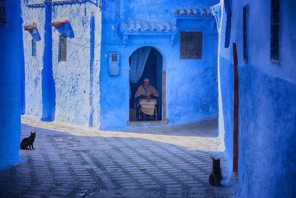 Chefchaouen Blue Street by Bogdan Negoita — canvas wall art