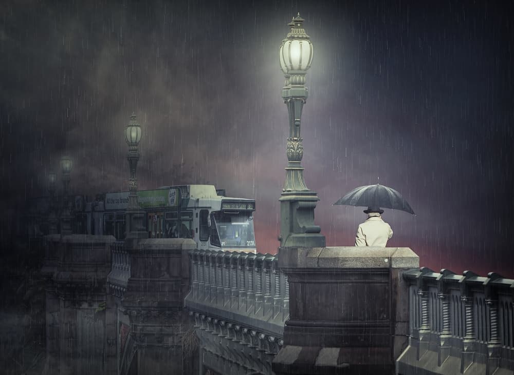 Man on Rainy Bridge by Adrian Donoghue — canvas wall art