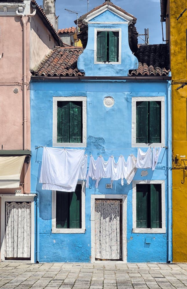 Burano Blue House Laundry by Francesca Ferrari — canvas wall art