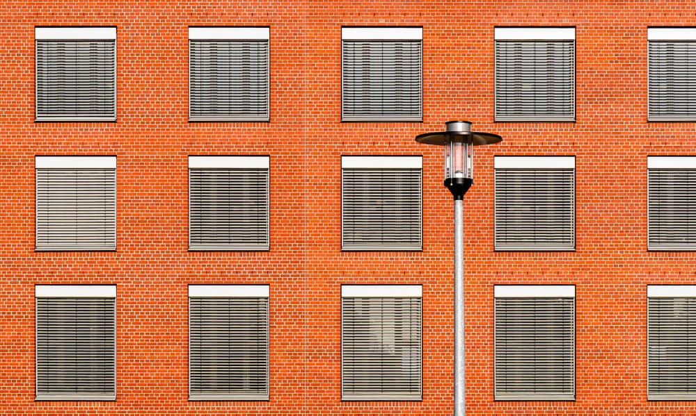 Orange Brick and Lamppost by Markus Auerbach — canvas wall art
