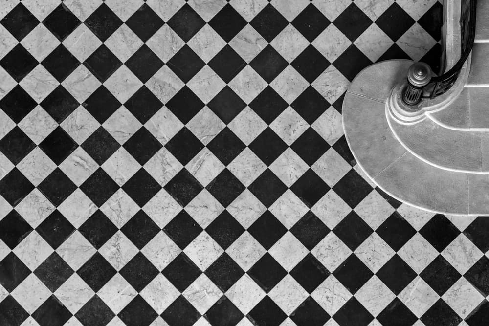 Black White Checkered Staircase by Jean-Louis VIRETTI — canvas wall art