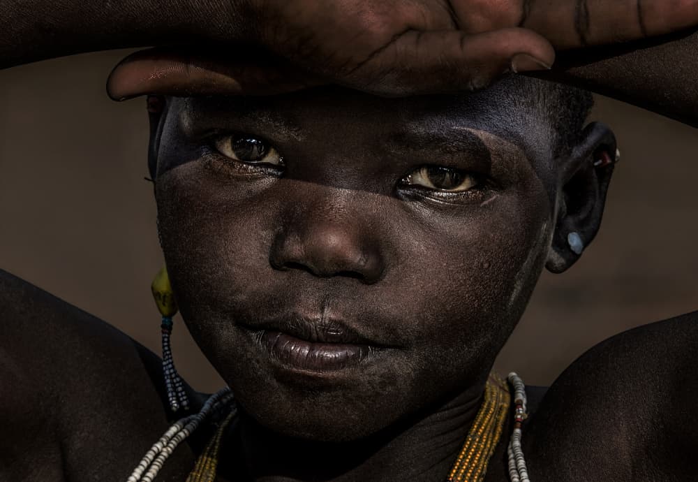 Intense Child's Gaze by Joxe Inazio Kuesta Garmendia — canvas wall art
