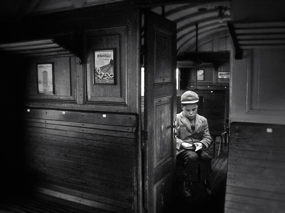Young Reader on Train by Holger Droste — canvas wall art