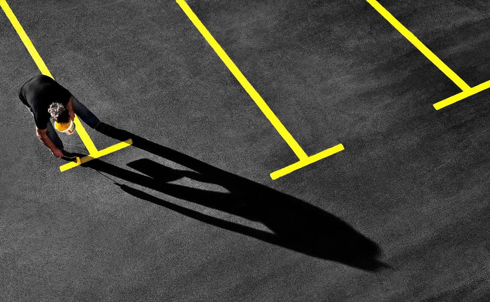 Man Painting Yellow Lines by Samanta Krivec — canvas wall art