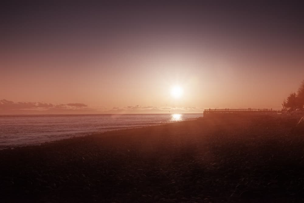 Peaceful Beach Sunset by Lynann Colligan — canvas wall art