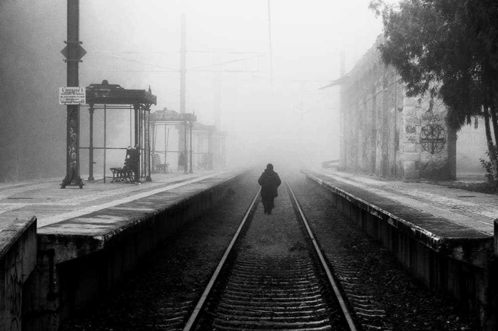 Misty Railway Wanderer by George Koulouridis — canvas wall art