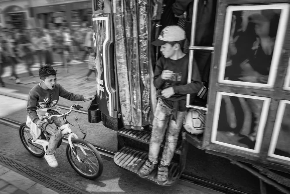 Kids Street Encounter by Pavol Stranak — canvas wall art