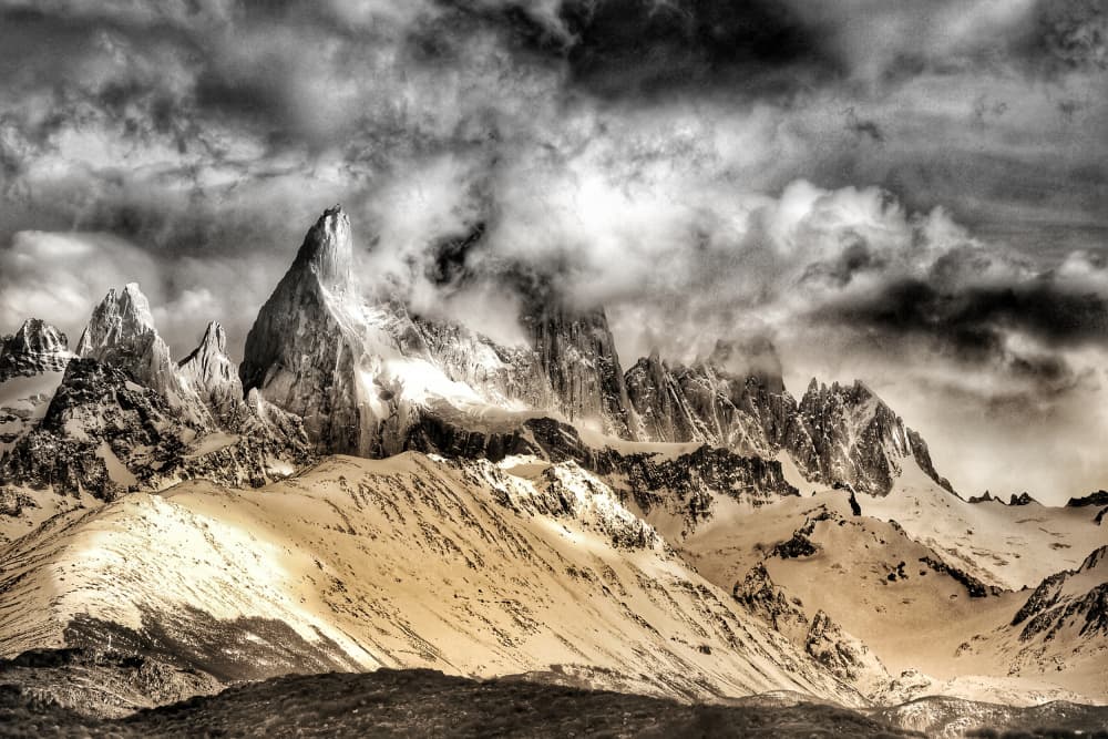 Snowy Peaks Dramatic Sky by txules — canvas wall art