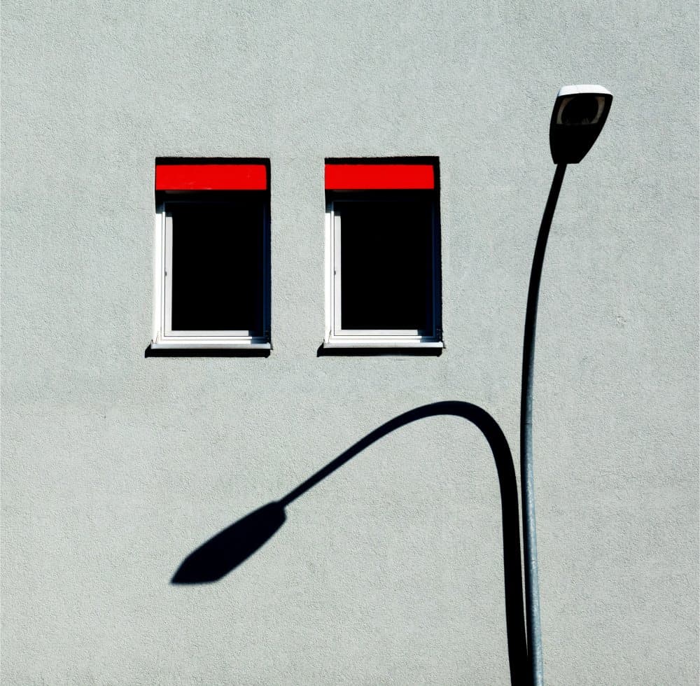Red Windows Curved Shadow by Stephan Rückert — canvas wall art