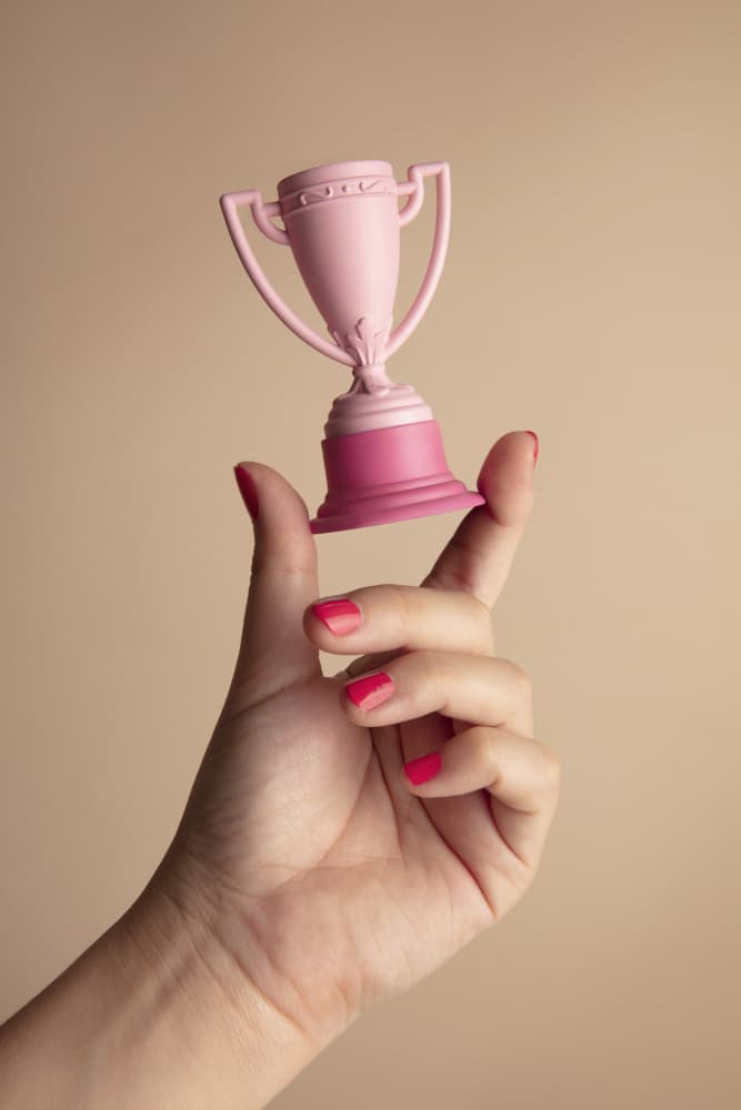 Pink Trophy Hand by Julia Ramiro — canvas wall art