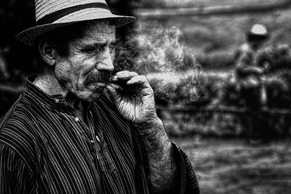 Rugged Man Smoking by Paulo Medeiros — canvas wall art