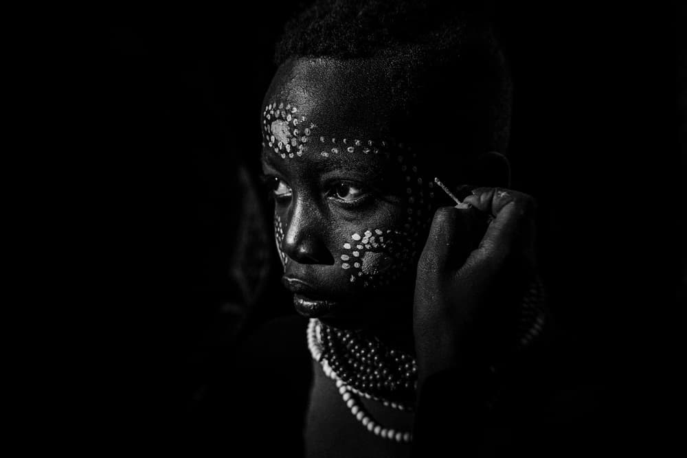 Tribal Face Adornment by ADIREK M — canvas wall art