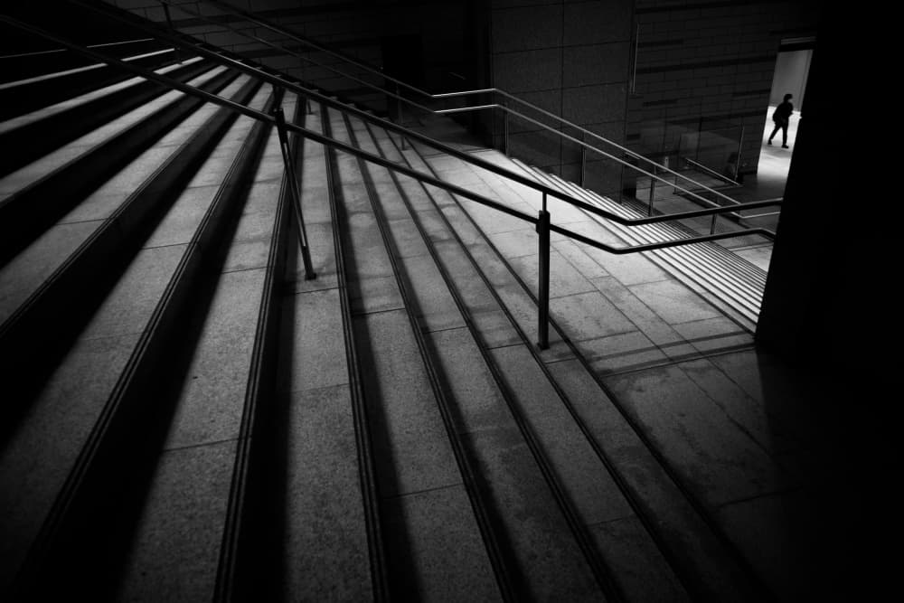 Shadowed City Steps by Satoshi Hata — canvas wall art