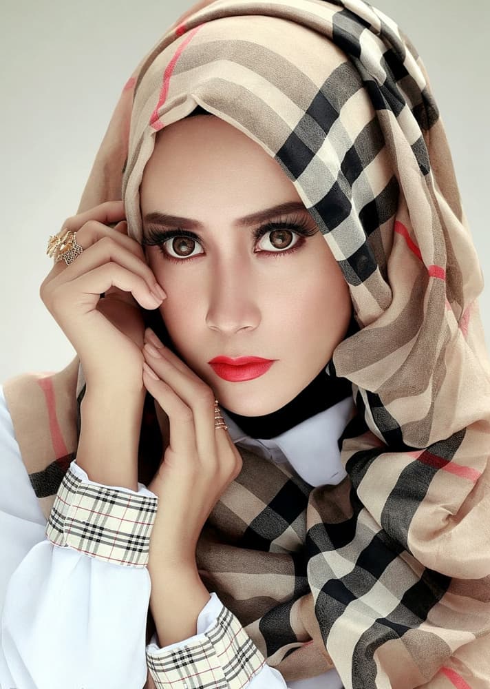 Elegant Woman in Plaid Hijab by Rezamoto — canvas wall art