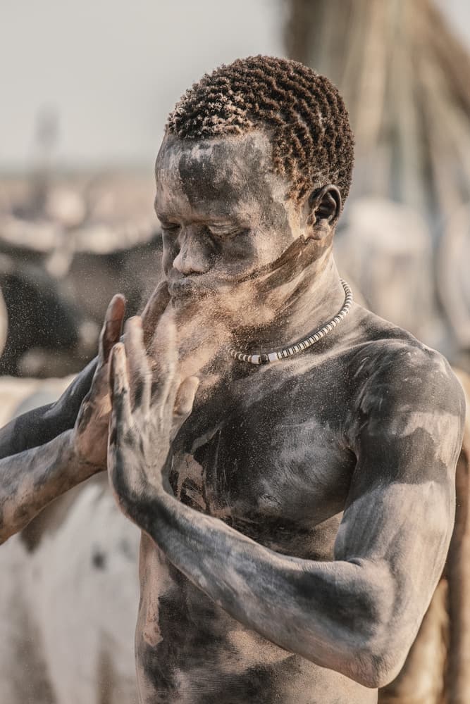 Tribal Man Applying Ash by Trevor Cole — canvas wall art
