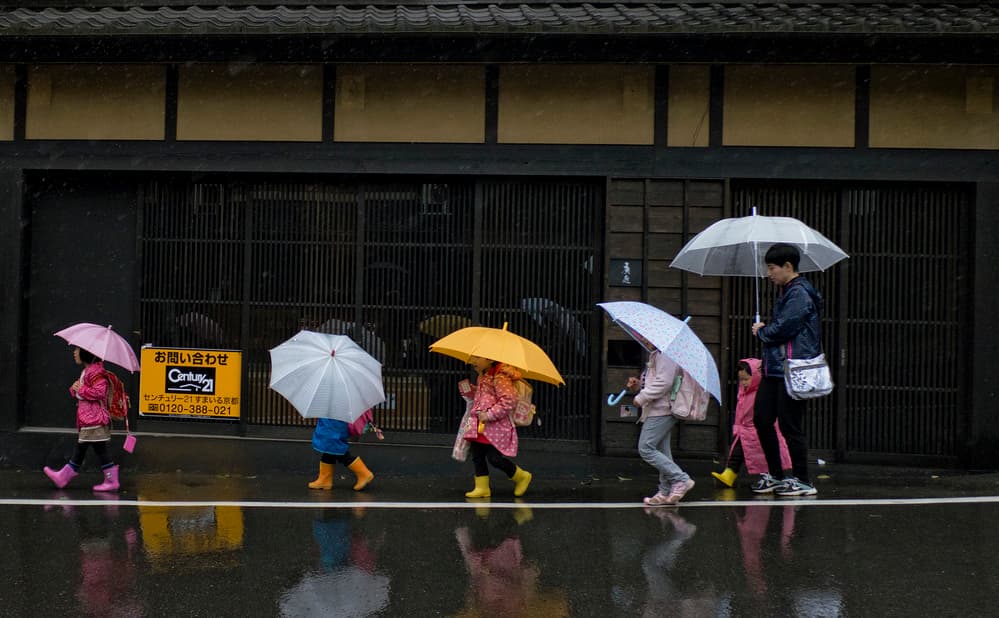 Colorful Umbrellas Rainy Walk by Lorenzo Grifantini — canvas wall art