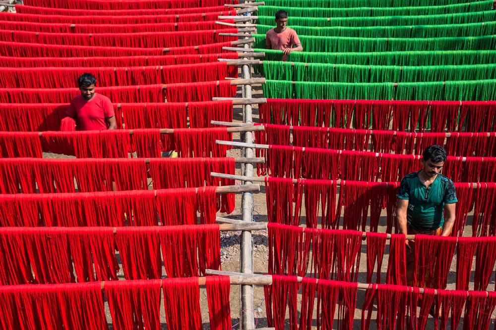 Vibrant Fabric Drying by Saurabh Sirohiya — canvas wall art