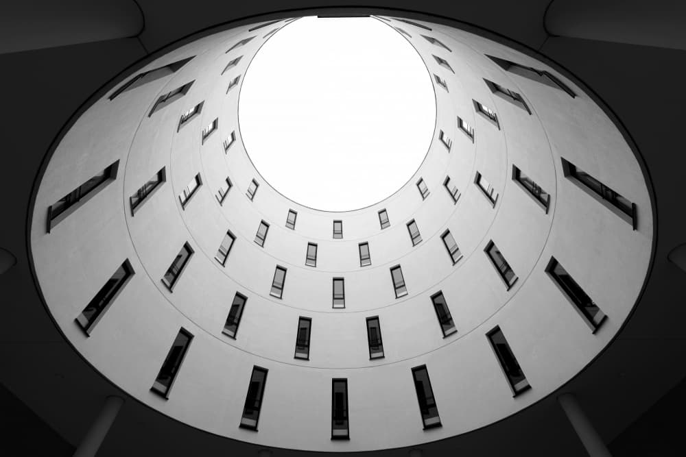Circular Building Sky View by Roswitha Schleicher-Schwarz — canvas wall art