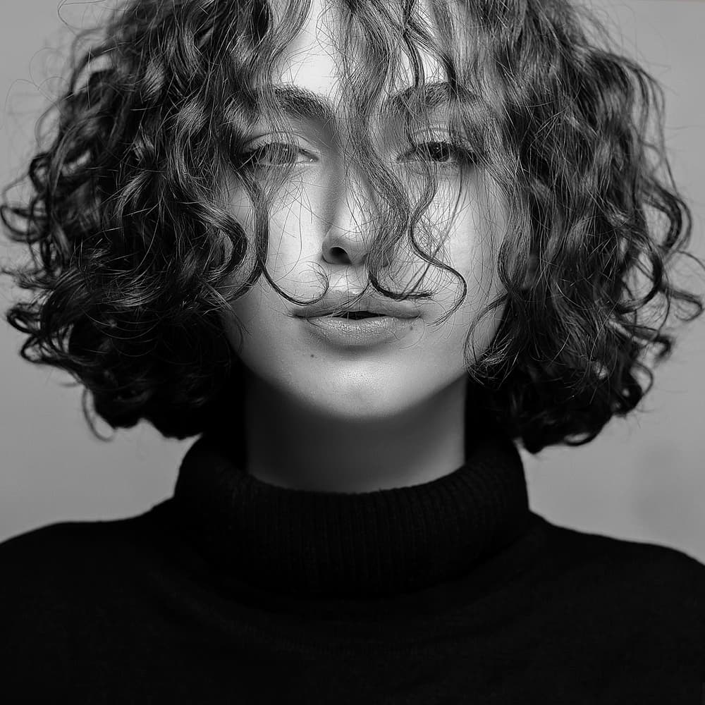 Mysterious Curly Haired Woman by Amin Hamidnezhad — canvas wall art