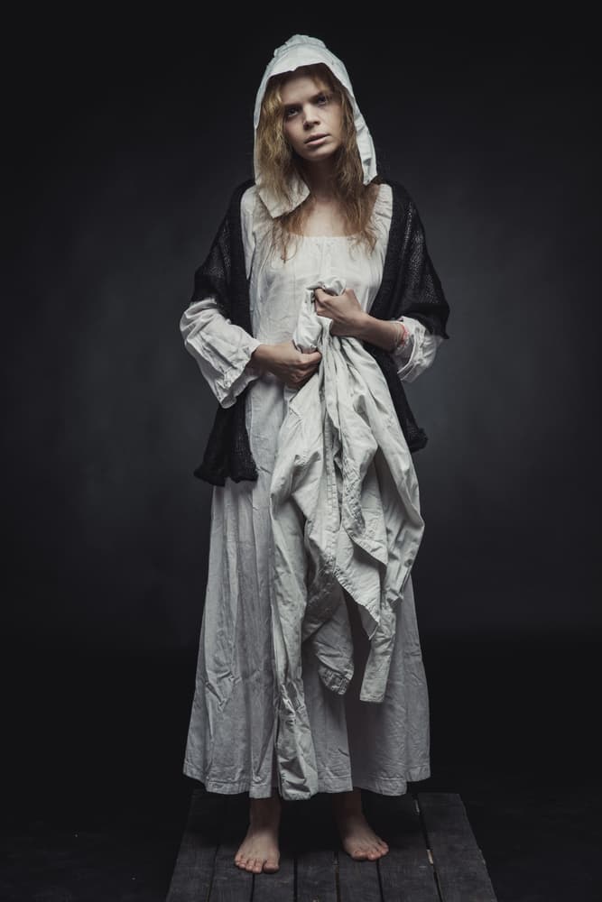 Young Woman in Hood by Photographer — canvas wall art