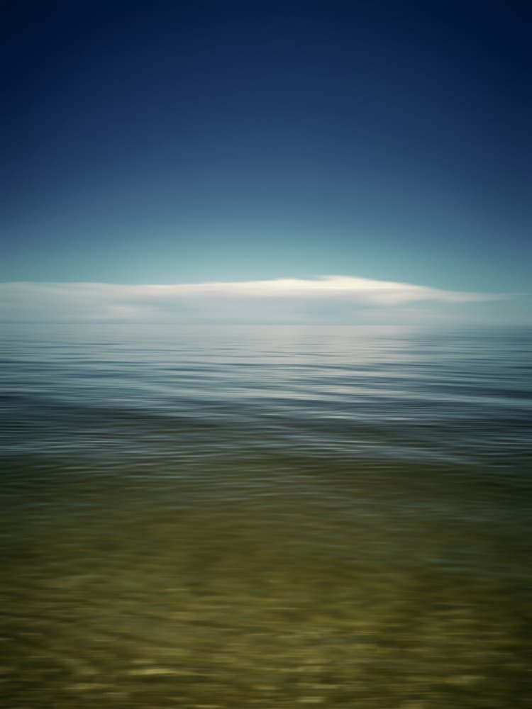 Serene Ocean Horizon by Angelo Cerantola — canvas wall art