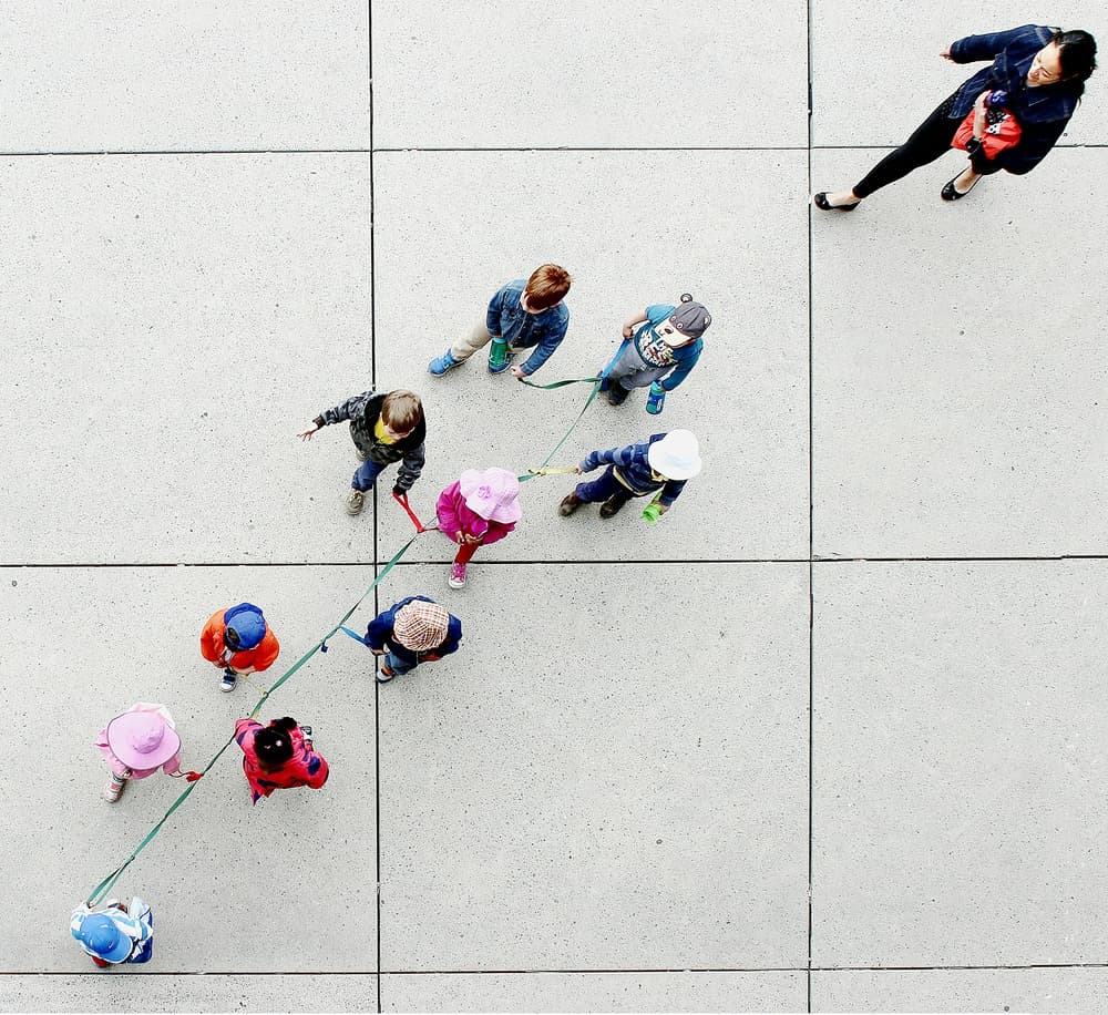Children's Group Walk by Jian Wang — canvas wall art