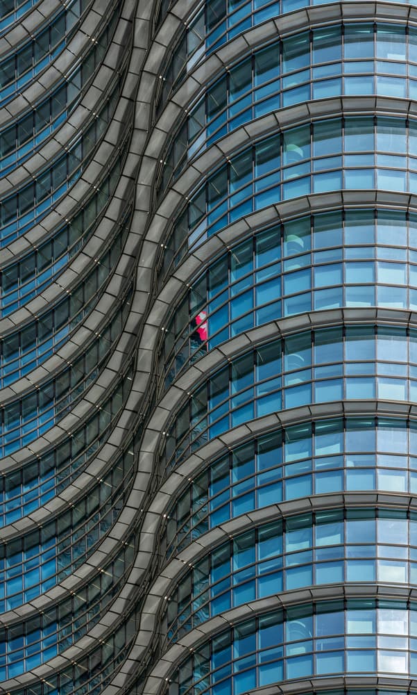 Wavy Building Window Cleaner by Wayne Pearson — canvas wall art