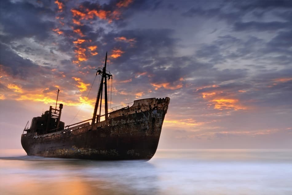 Shipwreck At Sunset by Maria Kaimaki — canvas wall art