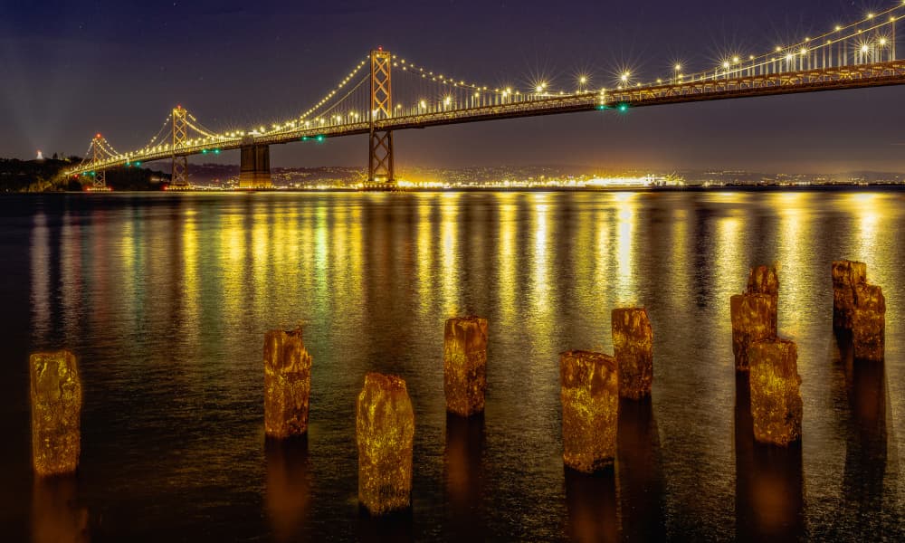 Bay Bridge Night Glow by Rob Ryan — canvas wall art
