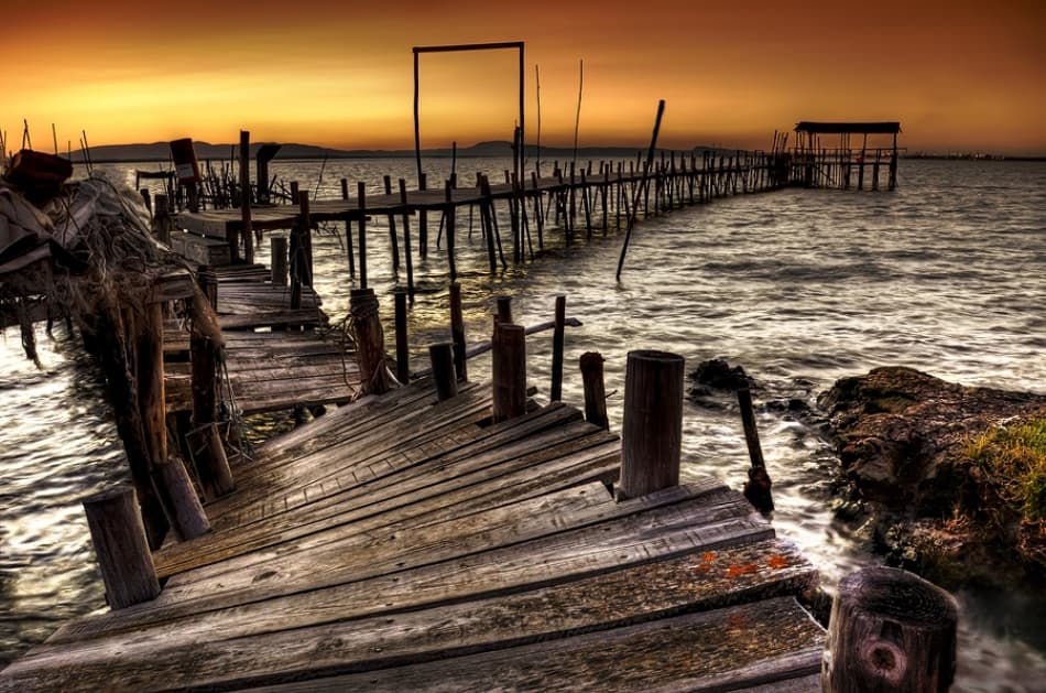 Rustic Sunset Pier by Paulo Gomes — canvas wall art