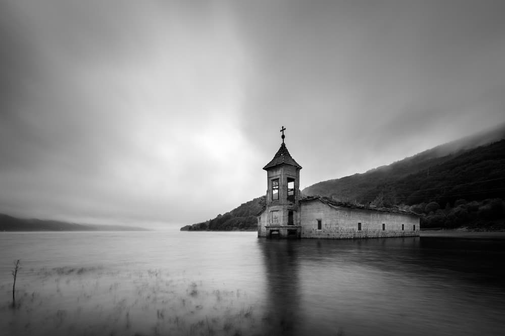 Misty Submerged Church by Burim Muqa — canvas wall art