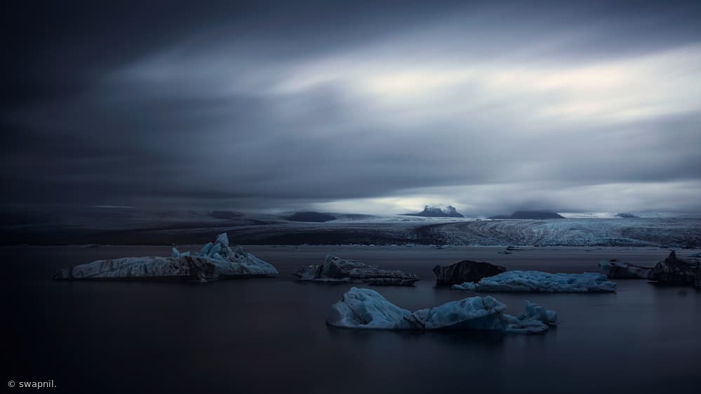 Moody Glacial Lagoon by swapnil deshpande — canvas wall art