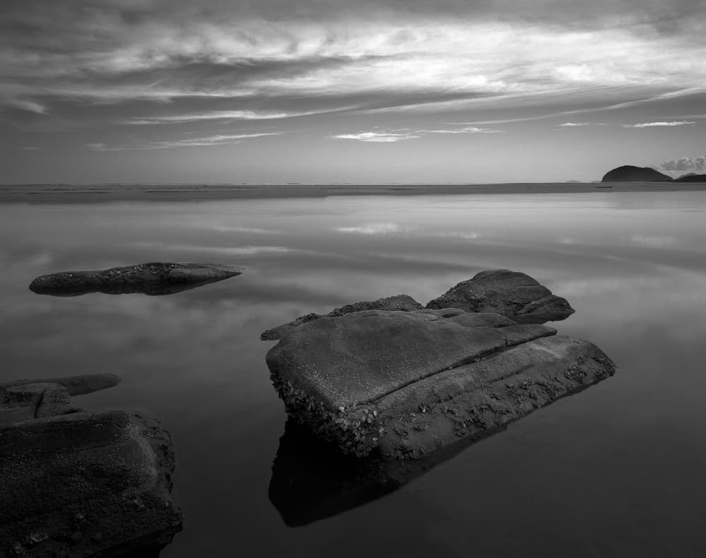 Still Water Rocks by Nana Sousa Dias — canvas wall art