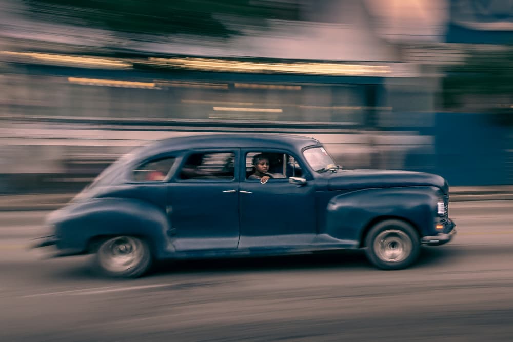 Classic Car Driving by Andy Bauer — canvas wall art