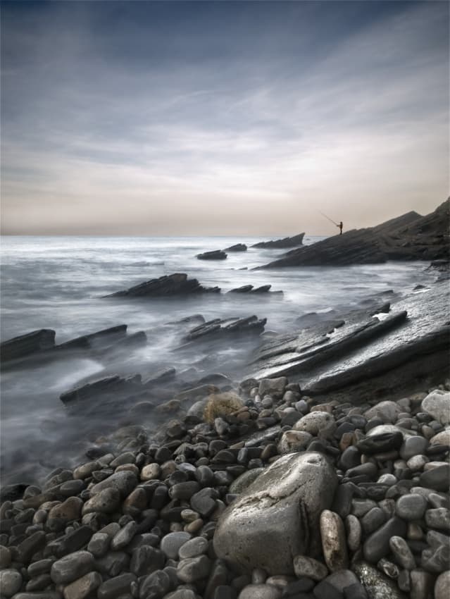 Misty Coastline Fisherman by Mikel Lastra — canvas wall art