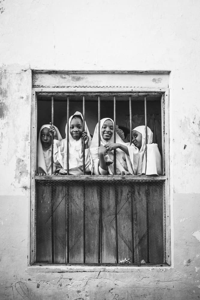 Smiling Girls Window by Gloria Salgado Gispert — canvas wall art