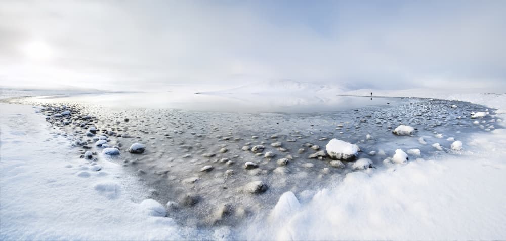 Frozen Winter Serenity by Nicola Molteni — canvas wall art