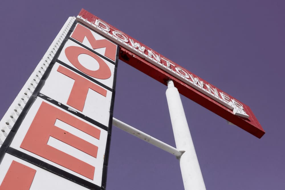 Downtowner Motel Sign by Pictufy Studio III — canvas wall art